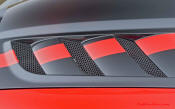 2009 Dodge Viper ACR - You're looking at Dodge's answer to the Porsche 911 GT3 RS or Lotus Exige, a road car you can drive to the track, hot lap all day, and drive back home, tires, brakes, and ego intact. The Viper ACR is raw. It's wired. And it's probably the best weekend racer yet from Detroit.