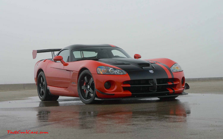 2009 Dodge Viper ACR - You're looking at Dodge's answer to the Porsche 911 GT3 RS or Lotus Exige, a road car you can drive to the track, hot lap all day, and drive back home, tires, brakes, and ego intact. The Viper ACR is raw. It's wired. And it's probably the best weekend racer yet from Detroit.