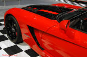 2009 Dodge Viper ACR - You're looking at Dodge's answer to the Porsche 911 GT3 RS or Lotus Exige, a road car you can drive to the track, hot lap all day, and drive back home, tires, brakes, and ego intact. The Viper ACR is raw. It's wired. And it's probably the best weekend racer yet from Detroit.