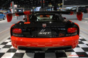 2009 Dodge Viper ACR - You're looking at Dodge's answer to the Porsche 911 GT3 RS or Lotus Exige, a road car you can drive to the track, hot lap all day, and drive back home, tires, brakes, and ego intact. The Viper ACR is raw. It's wired. And it's probably the best weekend racer yet from Detroit.