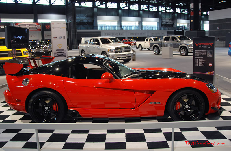 2009 Dodge Viper ACR - You're looking at Dodge's answer to the Porsche 911 GT3 RS or Lotus Exige, a road car you can drive to the track, hot lap all day, and drive back home, tires, brakes, and ego intact. The Viper ACR is raw. It's wired. And it's probably the best weekend racer yet from Detroit.