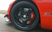 2009 Dodge Viper ACR - You're looking at Dodge's answer to the Porsche 911 GT3 RS or Lotus Exige, a road car you can drive to the track, hot lap all day, and drive back home, tires, brakes, and ego intact. The Viper ACR is raw. It's wired. And it's probably the best weekend racer yet from Detroit.