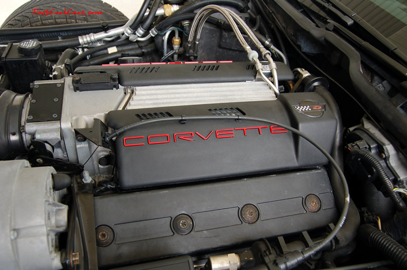 1994 Competition Yellow Chevrolet Corvette, 383 stroker LT1, 6 speed. New laser cut plastic Corvette letters installed in the insets on the fuel rail covers.