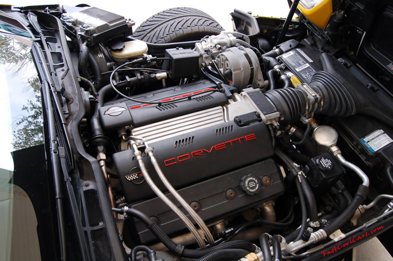 1994 Competition Yellow Chevrolet Corvette, 383 stroker LT1, 6 speed. New laser cut plastic Corvette letters installed in the insets on the fuel rail covers.