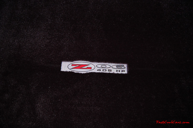 2002 Millennium Yellow Z06 Corvette - 405 HP Stock, at new home in Cleveland, Tennessee, new Lloyds trunk carpet kit with embroidered Z06 405 HP logo.