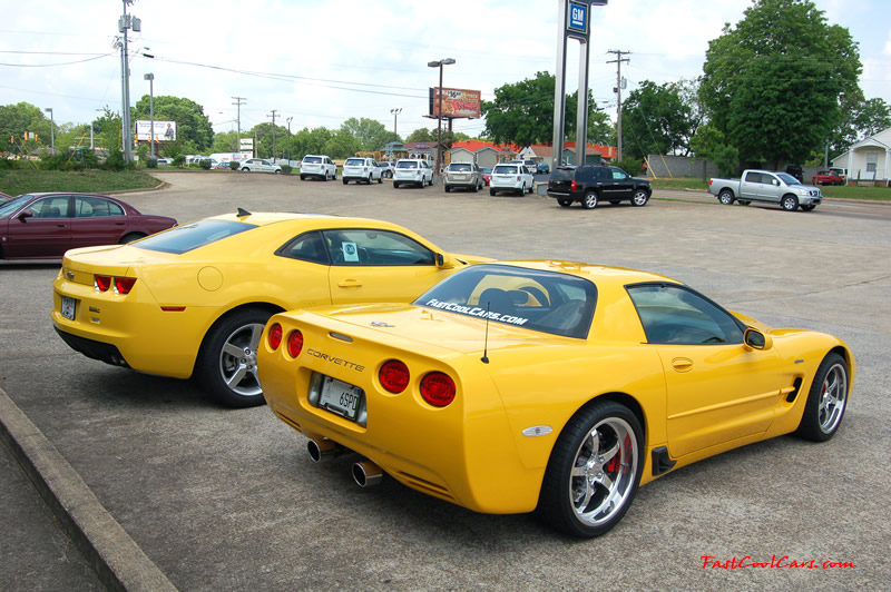 2010 Chevrolet Camaro 2LT and 2002 Supercharged Z06 Corvette, both in yellow.