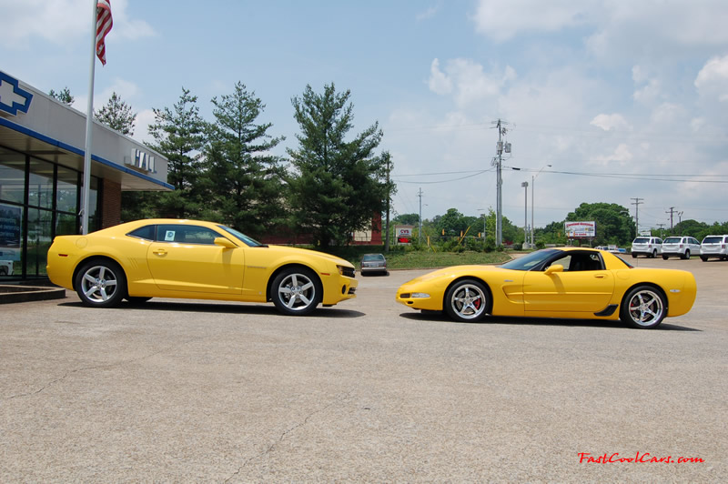 2010 Chevrolet Camaro 2LT and 2002 Supercharged Z06 Corvette, both in yellow.