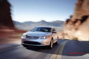 2010 Ford Taurus SHO returns with 365HP EcoBoost V6, Plus all wheel drive, paddle-shift six speed gearbox.