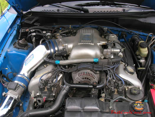 1998 Mustang Cobra Convertible - 1 of 223 - Electric blue, with 305 HP rating stock.