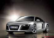 Audi R8 Designed to compete against the Porsche 911, the new Audi R8 features quattro permanent four-wheel drive, space frame aluminum body and the mid-mounted 420 bhp V8 FSI engine, and lots of carbon fiber.