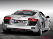 Audi R8 Designed to compete against the Porsche 911, the new Audi R8 features quattro permanent four-wheel drive, space frame aluminum body and the mid-mounted 420 bhp V8 FSI engine, and lots of carbon fiber.