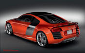 Audi R8 Designed to compete against the Porsche 911, the new Audi R8 features quattro permanent four-wheel drive, space frame aluminum body and the mid-mounted 420 bhp V8 FSI engine, and lots of carbon fiber.
