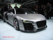 Audi R8 Designed to compete against the Porsche 911, the new Audi R8 features quattro permanent four-wheel drive, space frame aluminum body and the mid-mounted 420 bhp V8 FSI engine, and lots of carbon fiber.