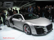 Audi R8 Designed to compete against the Porsche 911, the new Audi R8 features quattro permanent four-wheel drive, space frame aluminum body and the mid-mounted 420 bhp V8 FSI engine, and lots of carbon fiber.