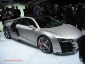 Audi R8 Designed to compete against the Porsche 911, the new Audi R8 features quattro permanent four-wheel drive, space frame aluminum body and the mid-mounted 420 bhp V8 FSI engine, and lots of carbon fiber.