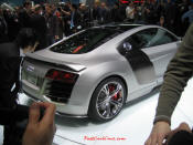 Audi R8 Designed to compete against the Porsche 911, the new Audi R8 features quattro permanent four-wheel drive, space frame aluminum body and the mid-mounted 420 bhp V8 FSI engine, and lots of carbon fiber.