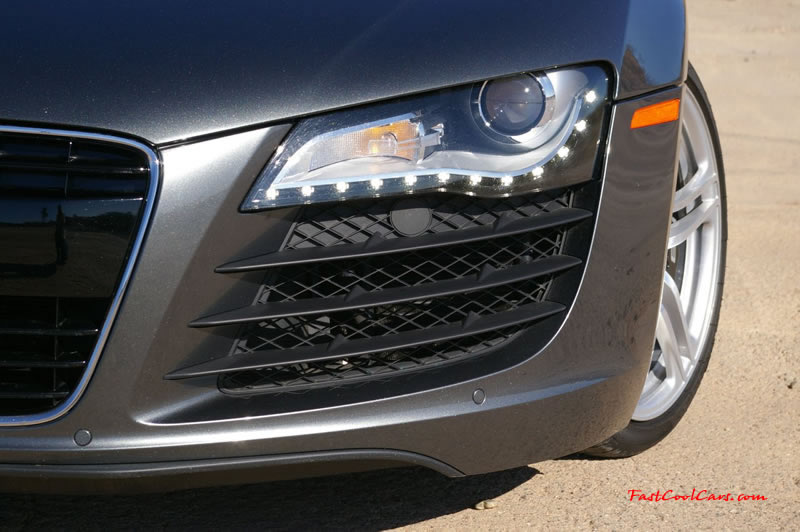 Audi R8 Designed to compete against the Porsche 911, the new Audi R8 features quattro permanent four-wheel drive, space frame aluminum body and the mid-mounted 420 bhp V8 FSI engine