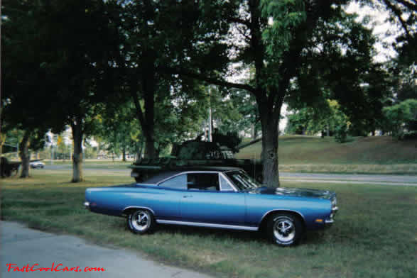 1969 Plymouth Satellite Mod top car. As you can see, it is a beauty. It sits in 4 chrome Magnum 500 wheels mounted on BF Goodrich TA's.