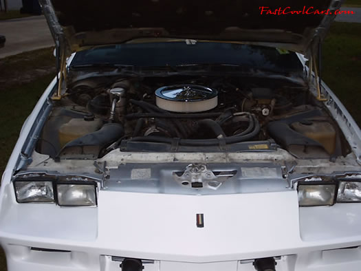 1984 Chevrolet Camaro Z-28 with new Edelbrock air cleaner and new paint job on the car.