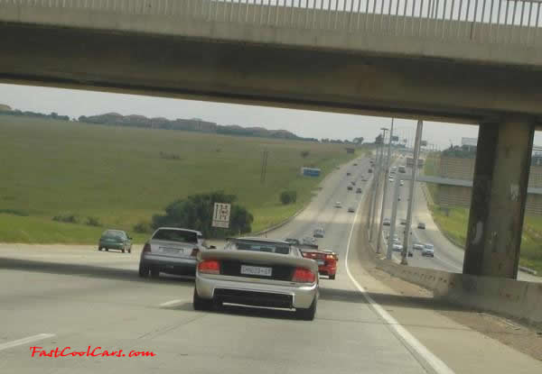 Very Fast Cool Exotic Supercar, driving on the wrong side of the road,... LOL