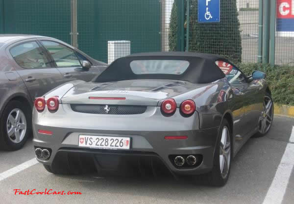 Very Fast Cool Exotic Supercar, graphite colored Ferrari roadster