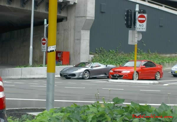 Very Fast Cool Exotic Supercar, silver roadster Ferrari.