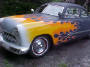 1950 Ford club coupe - better known as a shoebox. with custom flame paint job.