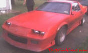 1991 Chevrolet Camaro RS. It originally came with the 3.1 V6, but I've built a 350 TPI motor with twin turbo for it.