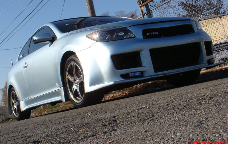 2005 Scion tC Azure Pearl with a TRD muffler, custom interior, blue led lights inside cabin area, changing color LED's, 17" ICW racing wheels