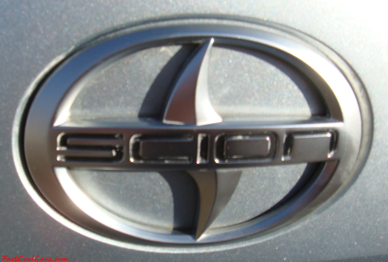 2005 Scion tC Azure Pearl with a TRD muffler, custom interior, blue led lights inside cabin area, changing color LED's, 17" ICW racing wheels