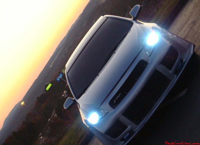 2005 Scion tC Azure Pearl with a TRD muffler, custom interior, blue led lights inside cabin area, changing color LED's, 17" ICW racing wheels