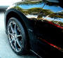 2003 Black Mitsubishi Eclipse Spyder convertible, with killer wheels, customized.