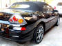 2003 Black Mitsubishi Eclipse Spyder convertible, with killer wheels, customized.