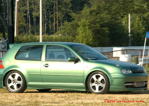 Lowriders that have been lowered, dropped, slammed, and scraping.