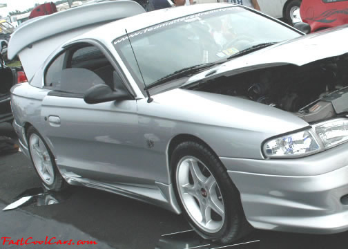 Lowriders that have been lowered, dropped, slammed, and scraping.
