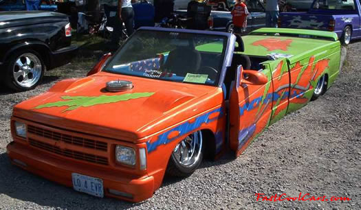 Lowriders that have been lowered, dropped, slammed, and scraping. Nice radical truck.