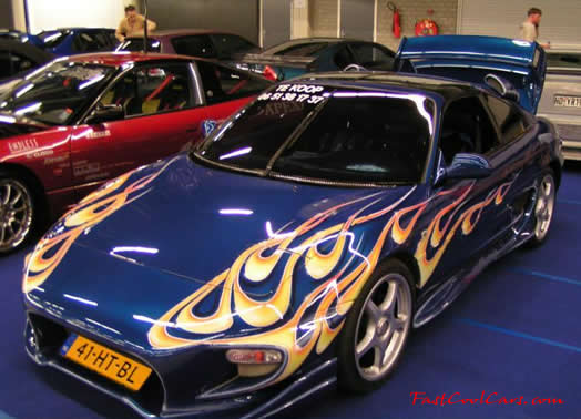 Lowriders that have been lowered, dropped, slammed, and scraping. Nice graphics.