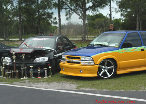 Lowriders that have been lowered, dropped, slammed, and scraping.