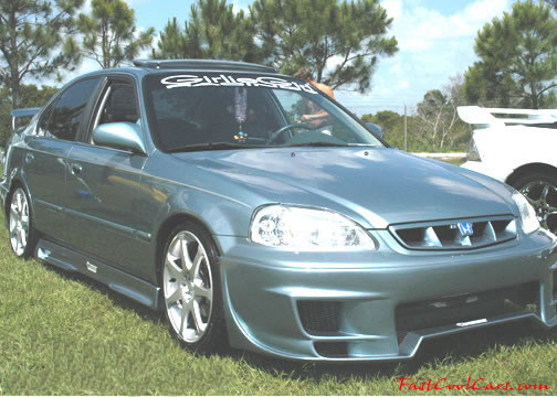 Lowriders that have been lowered, dropped, slammed, and scraping.