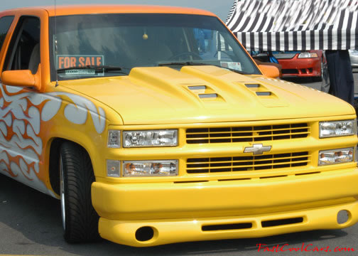 Lowriders that have been lowered, dropped, slammed, and scraping.