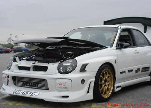 Lowriders that have been lowered, dropped, slammed, and scraping.