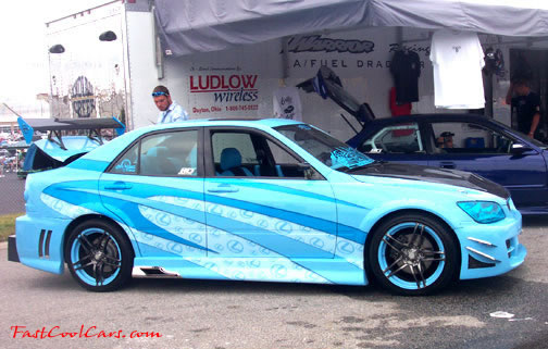 Lowriders that have been lowered, dropped, slammed, and scraping.