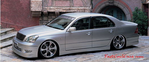 Lowriders that have been lowered, dropped, slammed, and scraping.