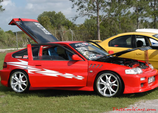 Lowriders that have been lowered, dropped, slammed, and scraping.