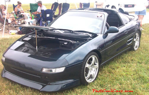 Lowriders that have been lowered, dropped, slammed, and scraping.