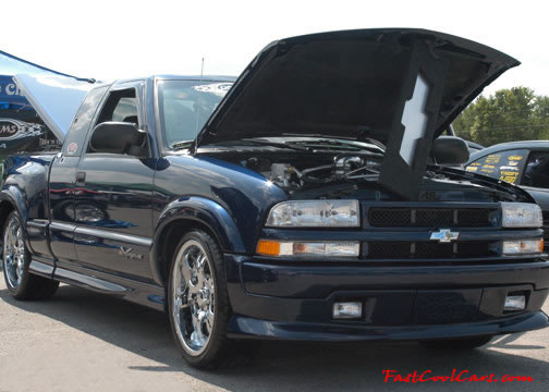 Lowriders that have been lowered, dropped, slammed, and scraping.