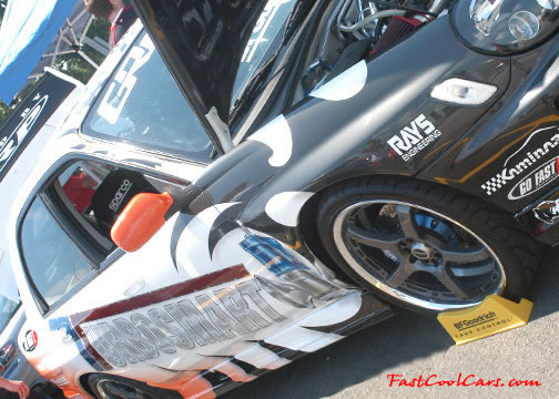 Lowriders that have been lowered, dropped, slammed, and scraping.