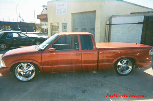 Lowriders that have been lowered, dropped, slammed, and scraping.
