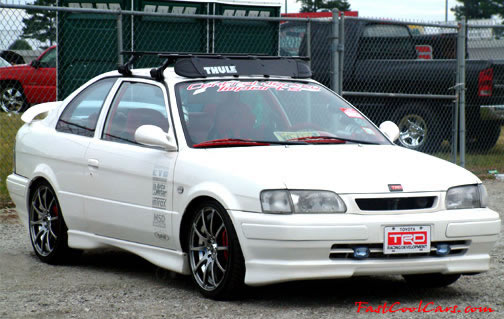 Lowriders that have been lowered, dropped, slammed, and scraping.