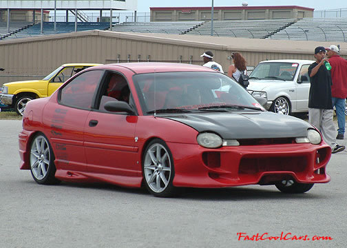 Lowriders that have been lowered, dropped, slammed, and scraping.